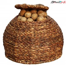 Wicker storage basket for walnuts and almonds